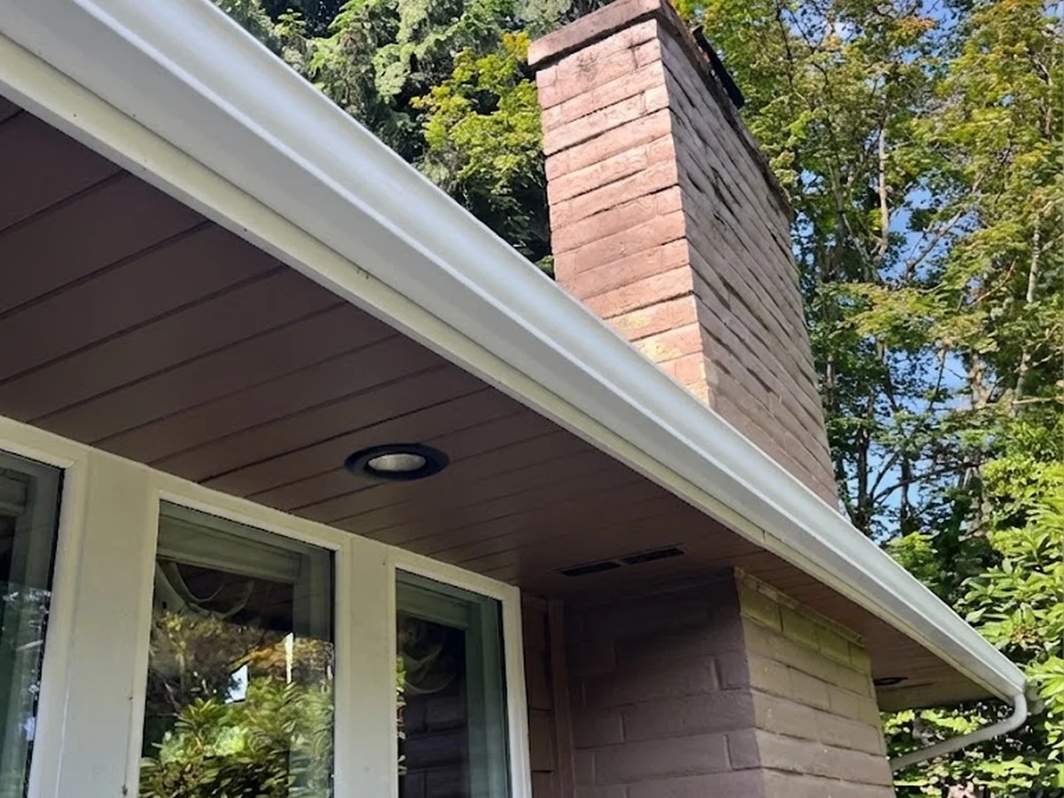 Bright white gutter face after exterior cleaning