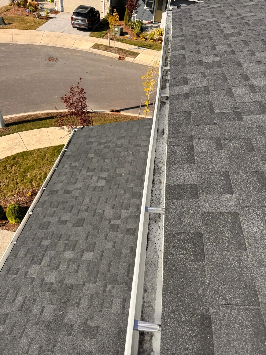 Same gutter completely cleared and clean after professional cleaning